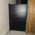 Backyard aluminum door fence